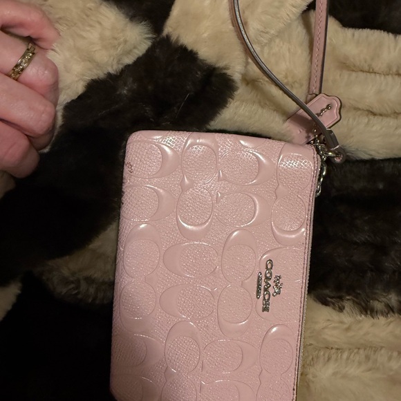 Coach Accessories - Coach Light Pink Embossed Wristlet
